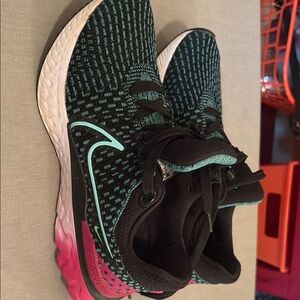 Nike Black and Pink Athletic Shoes with Cushioned Midsole